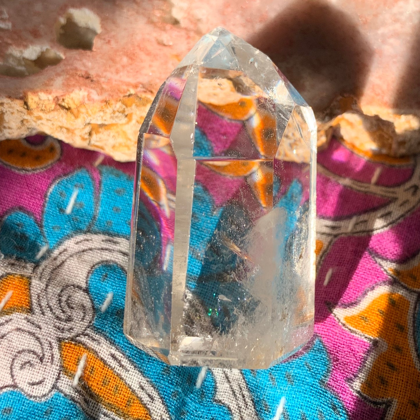 Quartz Point with Phantoms and Rainbows