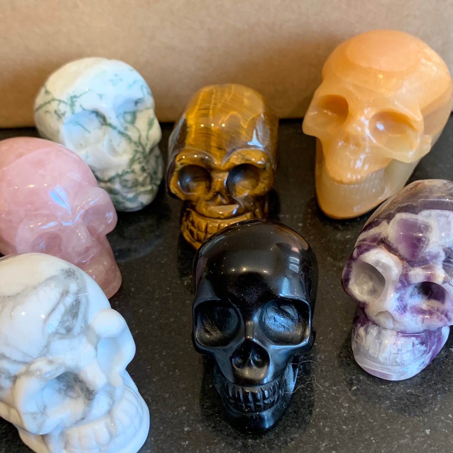 Carved Skulls // Dream Amethyst, Black Obsidian, Rose Quartz, Howlite, Orange Calcite, Tiger's Eye